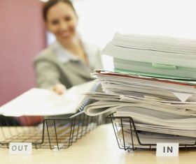 Woman sorting documents Stock Photo