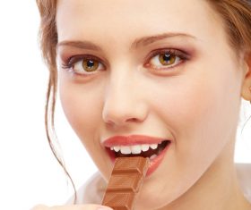Woman tasting chocolate Stock Photo 02