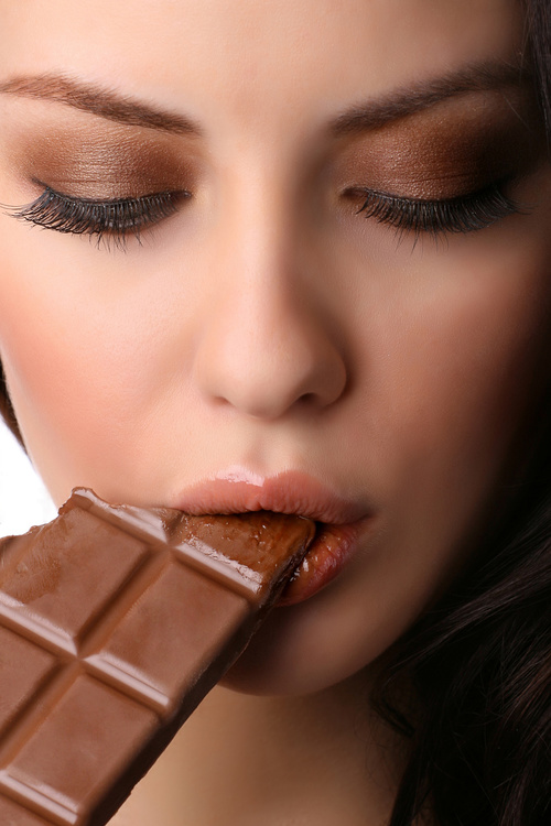 Woman tasting chocolate Stock Photo 03