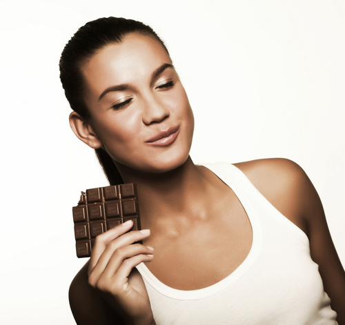 Woman tasting chocolate Stock Photo 05