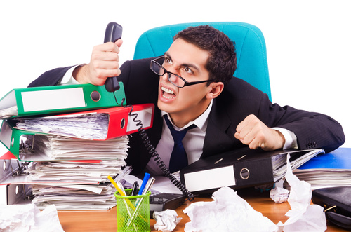 Work overload hysterical man Stock Photo