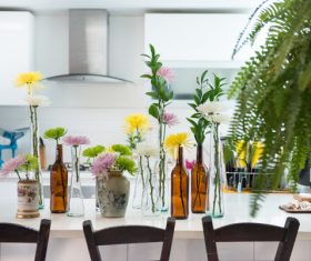 fresh flowers decoration in kitchen Stock Photo