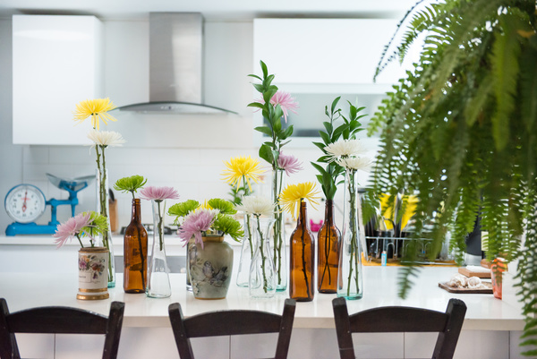 fresh flowers decoration in kitchen Stock Photo