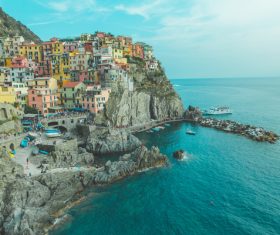 houses on rocky mountain sea scenery Stock Photo