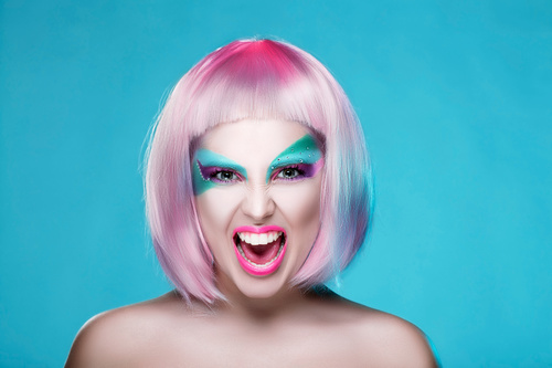 Avant-garde fashion girl makeup and funny expression Stock Photo