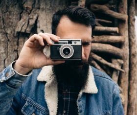 Bearded man with hands shoot camera Stock Photo