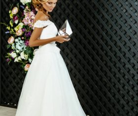 Beautiful woman holding rhombus bottle Stock Photo 01