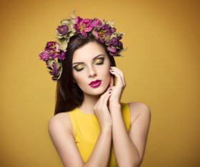 Beautiful young woman wearing floral headband Stock Photo 01