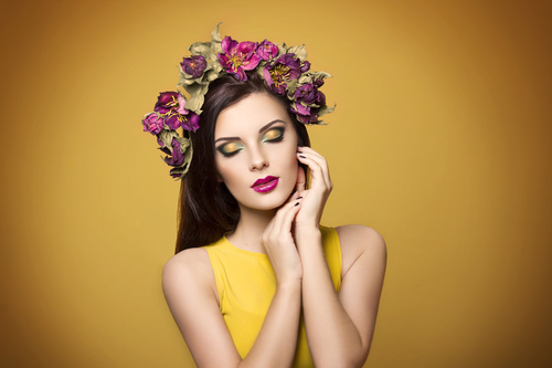 Beautiful young woman wearing floral headband Stock Photo 01