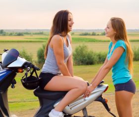 Best friend sitting on the motorcycle Stock Photo 01