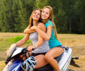 Best friend sitting on the motorcycle Stock Photo 03