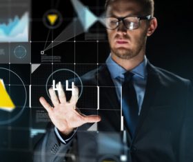 Businessman using virtual technology Stock Photo 13