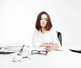 Businesswoman looking at documents on the desk Stock Photo 05