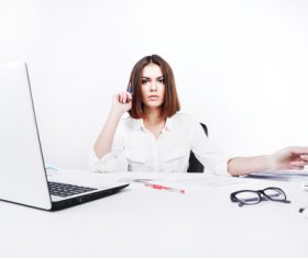 Businesswoman looking at documents on the desk Stock Photo 06