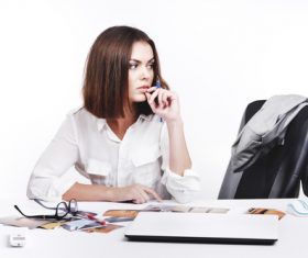Businesswoman looking at documents on the desk Stock Photo 10