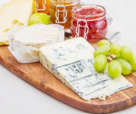 Cheese and jam on chopping board Stock Photo 02
