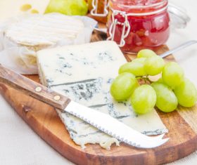Cheese and jam on chopping board Stock Photo 03