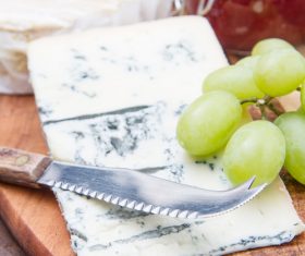 Cheese and jam on chopping board Stock Photo 06