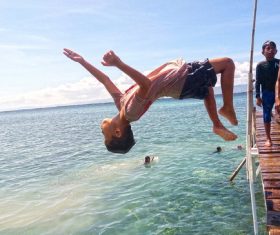 Child dive pose Stock Photo