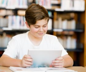 Childrens Uses tablets pc learning Stock Photo 01