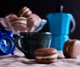Chocolate Cream Macaroon on the desktop Stock Photo 01
