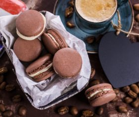 Chocolate Cream Macaroon on the desktop Stock Photo 04