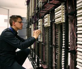 Computer room maintenance personnel Stock Photo
