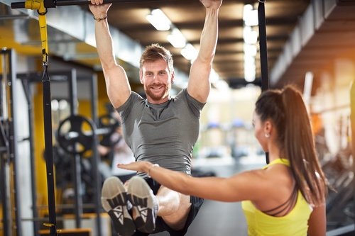 Couple doing sports in the gym Stock Photo 01