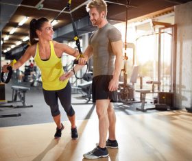 Couple doing sports in the gym Stock Photo 02