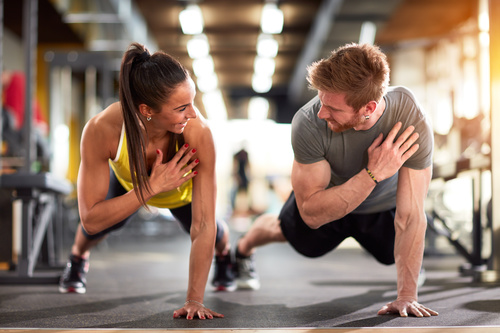 Couple doing sports in the gym Stock Photo 04