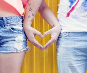 Couple than heart gesture Stock Photo