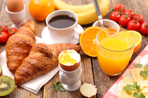 Croissant egg and coffee breakfast Stock Photo