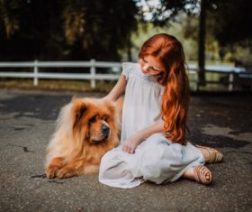 Cute little girl and pet dog Stock Photo