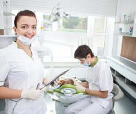 Dental clinic dentist nurse Stock Photo
