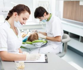 Dental nurse doing records Stock Photo