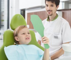 Dentist and child patient Stock Photo