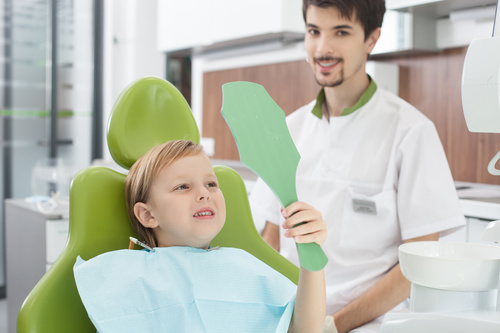 Dentist and child patient Stock Photo
