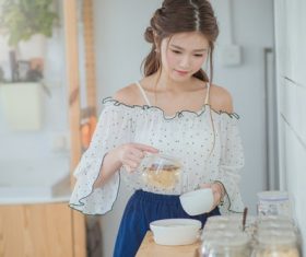 Elegant girl making tea Stock Photo