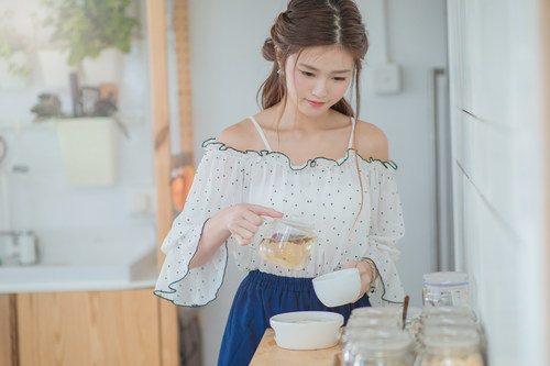 Elegant girl making tea Stock Photo