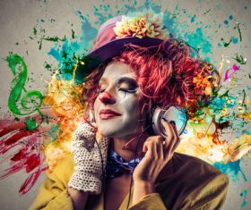 Female funny clown shape listening to music Stock Photo