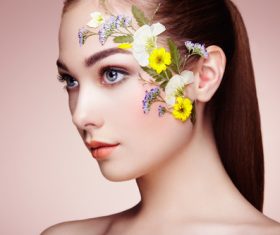 Female model facial flower decoration Stock Photo
