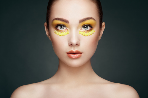 Female model with flowers and eye makeup Stock Photo 02