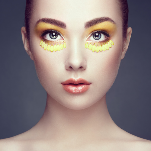 Female model with flowers and eye makeup Stock Photo 04