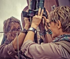 Female photographer framing Stock Photo