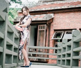 Gentle temperament Chinese cheongsam girl Stock Photo