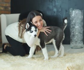 Girl hugs husky Stock Photo 01