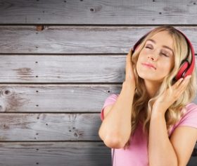 Girl reveling in music Stock Photo