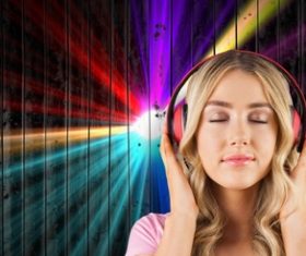 Girl with closed eyes listening to music Stock Photo