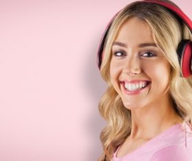 Girl with headphones smiling Stock Photo