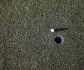 Golf ball and hole Stock Photo 01